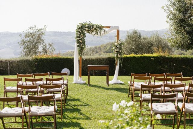 Stephanie and Aaron wanted an intimate wedding in Tuscany.The winning ingredients for an intimate wedding in Tuscany with a few relatives and friends include a charming Tuscan venue, refined cuisine, a carefully curated guest list, and an intimate and romantic atmosphere. The venue was on a hill in the heart of olive fields and vineyards, offering a breathtaking view and a fiery sunset 🌅 The ceremony was adorned with a flower arch framing the landscape 💒 The aperitif took place in the village of the venue, near the old barn 🥂 The magical dinner was on a long table amidst a cypress-lined avenue, under a starry sky 🌠 The wedding cake was a red velvet marked the beginning of dances and toasts 🍰 I'm so grateful to have met these Atlanta-based newlyweds 💕 @steph_aroni#destinationwedding #intimatewedding#destinationweddingtuscany #weddingintuscanyThanks for the photos @lennypellico Would you like to know more about this wedding?